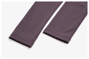 Close-up of double-stitched seams and high-stretch brushed fabric texture on yoga wear