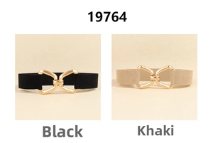 Detail of elastic waist belts in black and khaki with gold geometric buckles