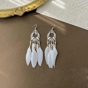 Ethnic style feather crystal drop earrings with silver metal tribal totem design