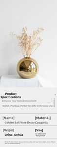 Macro shot of gold spherical ceramic vase featuring a smooth metallic plated finish