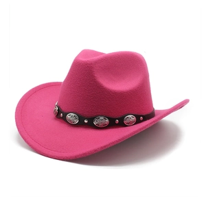 Detail of rose red wool felt cowboy hat with vintage silver patterned buckles on black band