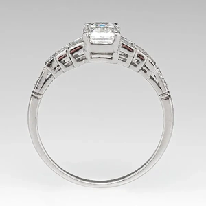 Art Deco emerald cut diamond ring in silver finish with pavé set baguette side stones
