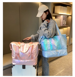Travel bag on luggage handle showing double-layer storage and waterproof fabric texture