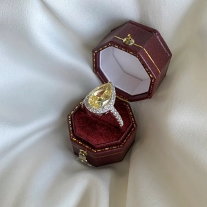 Elegant S925 sterling silver ring with a pear-cut yellow zircon in a red velvet box