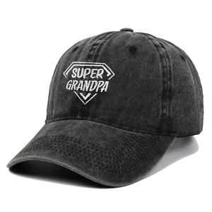 Close-up detail of a washed black distressed baseball cap with Super Grandpa embroidery