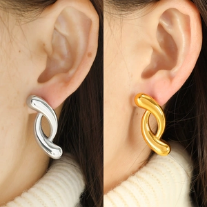 Minimalist irregular twisted hoop earrings in gold and silver finish for women