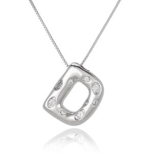 Macro view of silver color letter D pendant with sparkling pavé zircons and box chain