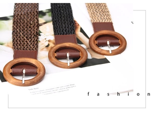 Three bohemian woven belts with round wooden buckles in dark brown, black and beige