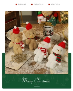 Close-up of plush Christmas teddy bears in red knit hats and scarves for festive decor