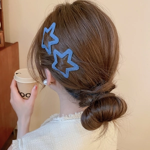Blue denim fabric star hair clips worn on bun hairstyle for daily hair accessories