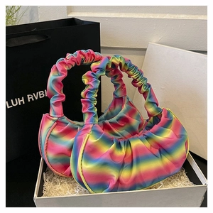 Rainbow gradient pleated dumpling bag in a luxury gift box with raffia paper