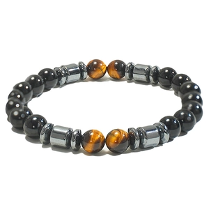 Tiger eye and black onyx beaded magnetic bracelet with hematite spacers on white background