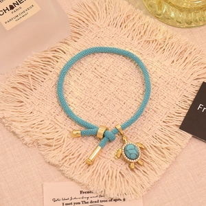 Light luxury turtle charm woven bracelet with blue natural stone and gold steel hardware