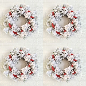 Mini Christmas wreath set with red berries, silver ornaments and faux snow frosting