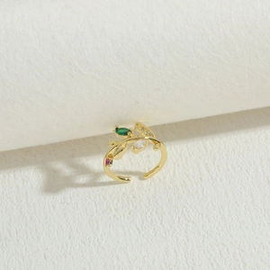 Detailed view of 14K gold leaf ring with marquise green zircon and colorful stones