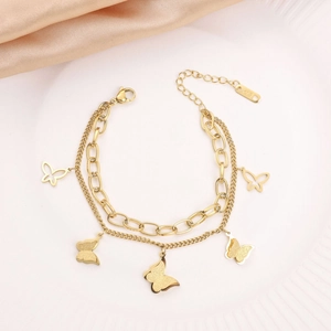 Double-layer gold butterfly bracelet in titanium steel with hollow and solid pendants