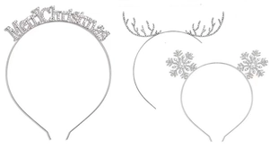 Detail view of silver metal Christmas headbands with rhinestone antlers and snowflakes