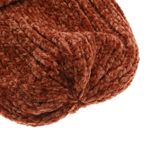 Close-up of rust red chenille knit hat showing soft texture and woven details