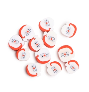 Macro shot of 12 Santa Claus clay beads for DIY Christmas jewelry crafts on white surface