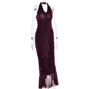 Detail of deep purple halter neck dress featuring ruffled layers and ruched texture fabric