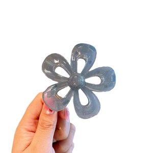 Elegant grey camellia flower hair claw clip in jelly acrylic for back of head styling