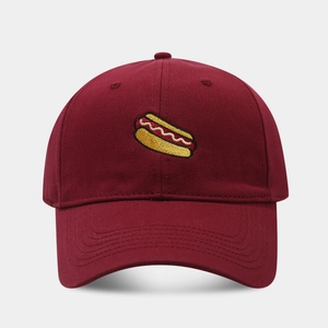 Burgundy cotton baseball cap with embroidered hot dog pattern on a minimalist background