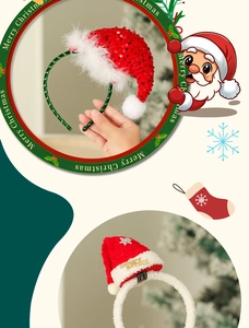 Detail showing red Christmas hat hair clip with festive sequins and decorative feathers