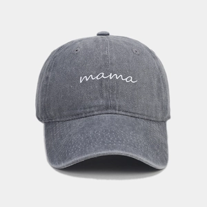 Close-up of vintage grey washed cotton baseball cap with white mama script embroidery