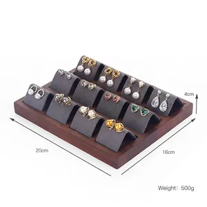 Walnut wood earring display stand with grey microfiber inserts for jewelry storage