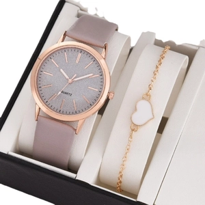 Elegant rose gold quartz watch with grey leather strap and gold heart pendant bracelet set