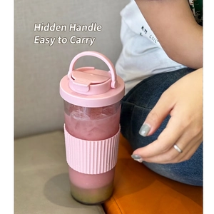 Pink Tritan straw cup with hidden handle and silicone sleeve for bubble tea