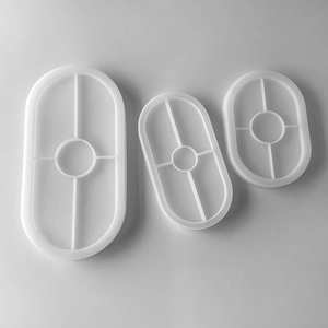 Detailed top view of three oval silicone coaster molds in various sizes for resin DIY