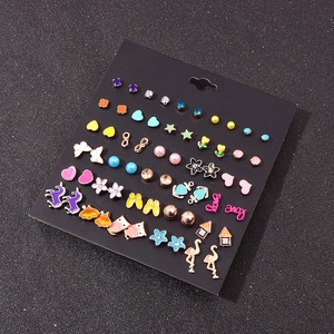 Set of 30 pairs colorful geometric stud earrings with animals and hearts on black card
