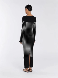 Elegant knit long sleeve dress with black and white stripes and back slit detail