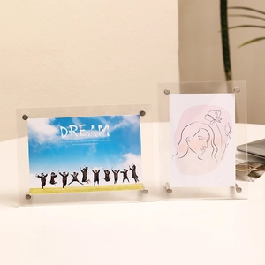 Transparent acrylic photo frame in vertical and horizontal views with metal stand screws