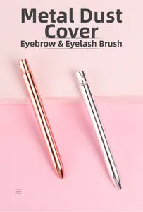 Macro detail of rose gold and silver metal dust caps for eyebrow and eyelash brushes