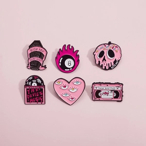 Pink and black enamel pin set featuring skull apple, cassette tape, and record heart shapes