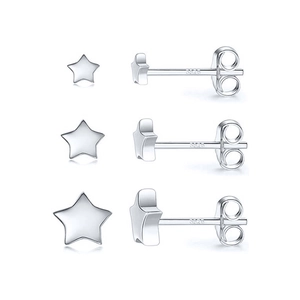 Detail of s925 sterling silver star stud earrings with visible hallmark stamps