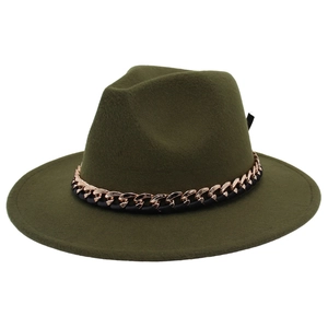 Close-up of olive green wool fedora hat featuring a chunky rose gold chain and leather band