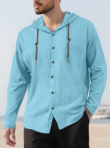 Close-up of light blue cotton hoodie shirt with brown drawstrings and wooden buttons