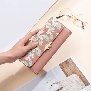 Elegant pink long tri-fold wallet for women with floral print and metal buckle