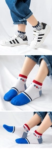 Detail view of mesh cotton kids socks with cute bear pattern and sea life lettering