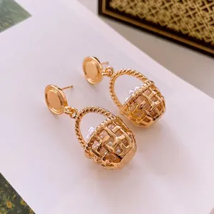 French vintage gold basket earrings with white pearls in a high-quality textured design