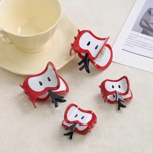 Cute red apple hair clips in various sizes for stylish summer bun hairstyles