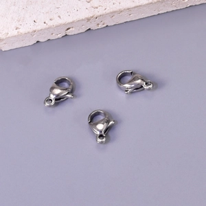 Three silver 304 stainless steel lobster clasps for DIY jewelry making on stone