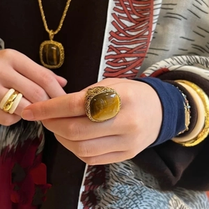 French vintage gold ring with pink crystal and turquoise stone in a retro design