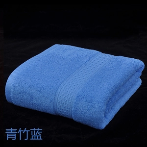Detailed close-up of bamboo blue cotton bath towel featuring a soft terry texture