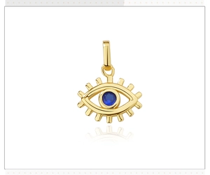 Macro shot of 925 silver evil eye pendant with blue zircon and gold plating details