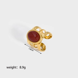 Detail view of 18mm red oval stone ring with three-layer hammered gold band weighing 8.9g