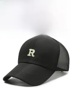 Detail of black quick-dry baseball cap featuring breathable mesh and 3D embroidered R letter